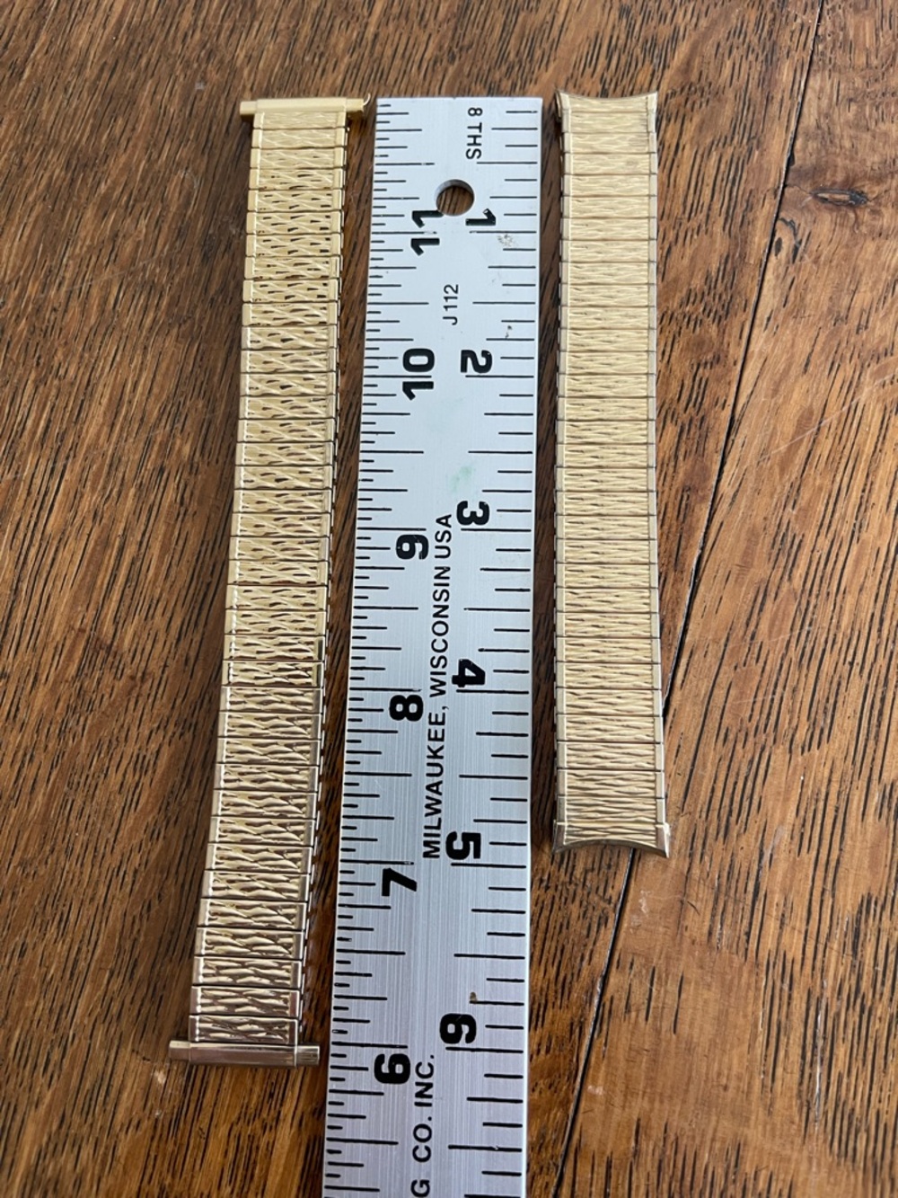 Speidel Twist O Flex gold tone watch bands for men. Two included plus one free.